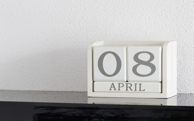White block calendar present date 8 and month April