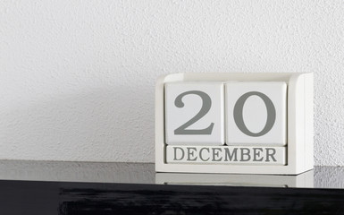 White block calendar present date 20 and month December