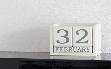 White block calendar present date 32 and month February - Extra day