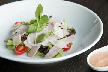 Delicious view of ham salad with vegetable