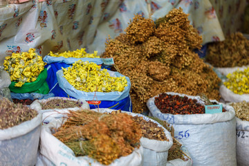 Bags of dried herbal tea for sale at city local market. Lahic. Azerbaijan