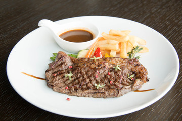  Beef steak with sauce on white plate