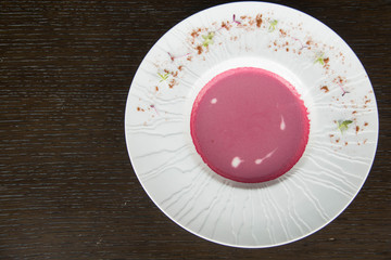  Beetroot cream soup in a white bowl