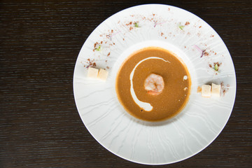 Shrimp soup in a white bowl