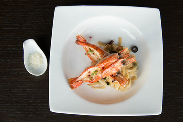 plate of spicy spaghetti with shrimps.