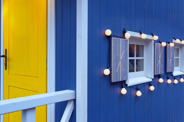 Blue house with a yellow door