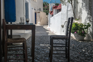 coffee break at greek tavern in santorini