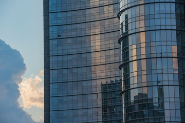 Fototapeta na wymiar Corporate concept - detail of modern glass building in Milan