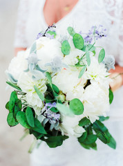 White and purple wedding bouquet