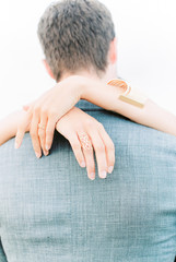 bride holding her groom