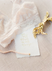 pink lingerie with calligraphy quote