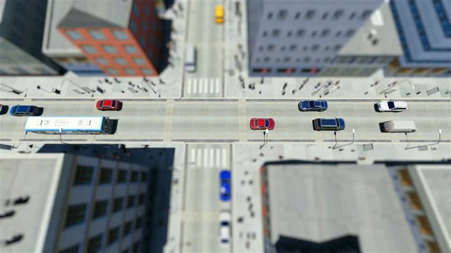Tilt shift of walking people and traffic in the city