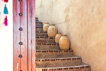 decoration clay jar on stairs in Morocco building 