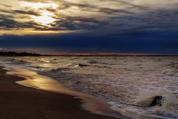 Waves beating against Latvia.Liepaja.Karosta. described the fortress ruins