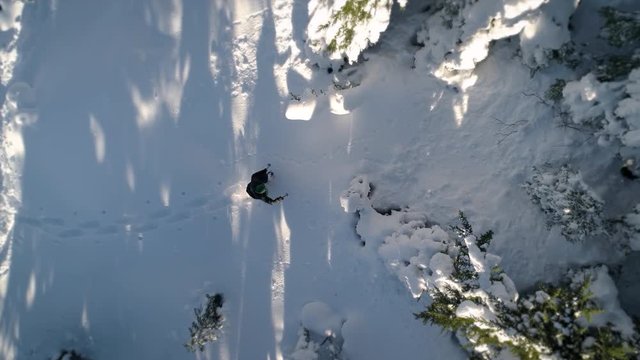 Snowshoeing Abstract Overhead Aerial Angle Slow Motion in Fresh Powder