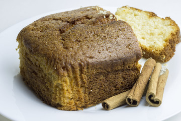 Homemade cake with cinnamon sticks