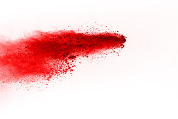 abstract powder splatted background. Red powder explosion on black background. Colored cloud. Colorful dust explode. Paint Holi.