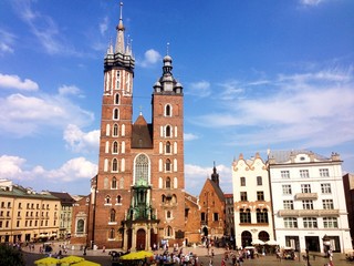 Naklejka na ściany i meble Kosciol Mariacki (The St Mary church) at the main square in Krakow, Cracow, Poland