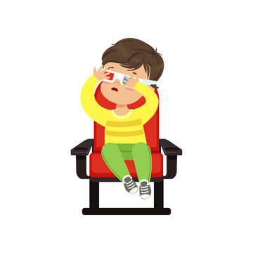Frightened little boy in 3d glasses sitting on a red chair and watching 3D movie in the cinema vector Illustration