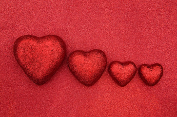 Fototapeta na wymiar Valentines Themed Background on a Red Glitter