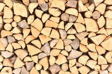 Old firewood for the fireplace.Wooden texture. Preparation of wood. Folded firewood. Firewood.