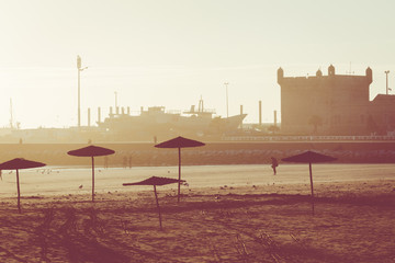 Sunset in the background in the beach at Essaouira, Morocco.