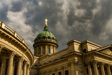 Fototapeta na wymiar Kazan Cathedral - Dark clouds and bright cross, Saint-Petersburg, Russia