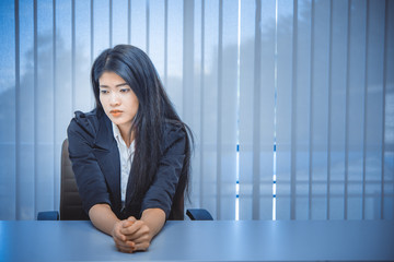 Close up sad woman in the office,stress girl from hard work,Heartbreak from boyfriend,Thailand people