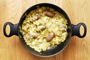 Savoy cabbage wit fresh sausage