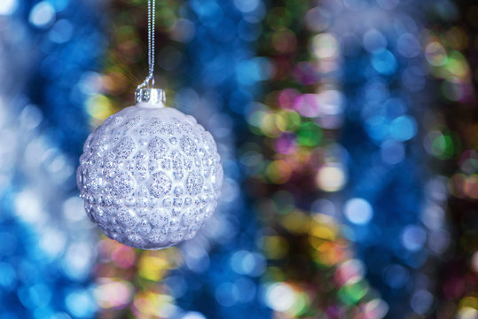 Close up elegance christmas decoration balls with shiny glare hanging on abstract glitting background with copy space for postcard 14