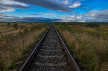 Fototapeta na wymiar Railway track on the sky background
