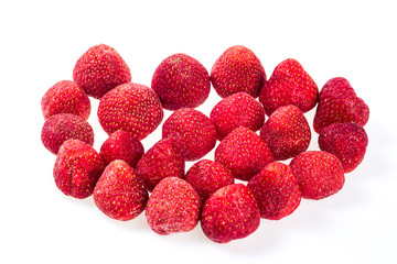 luscious frozen strawberries isolated on white background, delicious first class organic fruit as a concept of summer vitamins