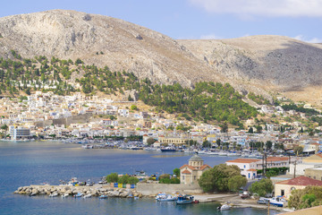 View Greek port Pothia on island Kalymnos. Landscape view on Kalimnos harbor in Aegean sea, Dodecanese, Greece.