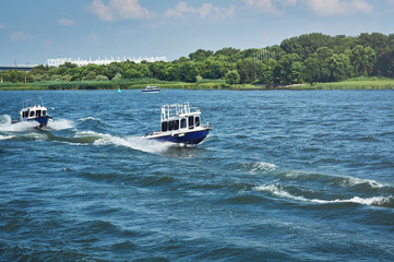 Fototapeta premium High speed boats on river moving
