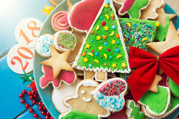 Plate with tasty holiday Gingerbread Cookies  - Happy New Year card 