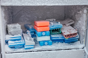 Well plate with test tubes with frozen DNA samples for PCR-reaction analysis in the fridge