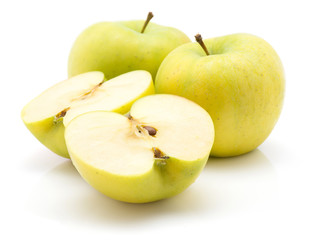 Two apple (Smeralda variety) halves and two whole isolated on white background green yellow.