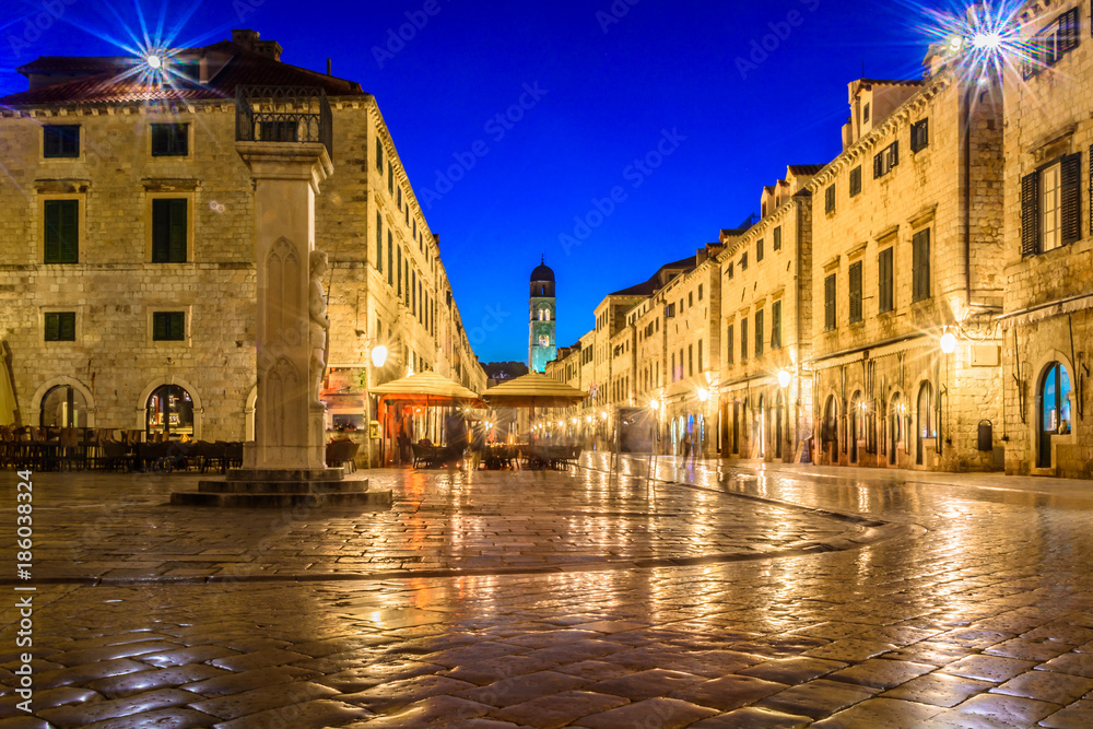 Wall mural Dubrovnik Stradun famous street. / Evening view at Stradun famous street in Dubrovnik city, historical tourist destination in Europe. 