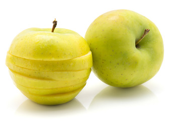 Sliced apple (Smeralda variety) isolated on white background one whole and one sliced comparing.