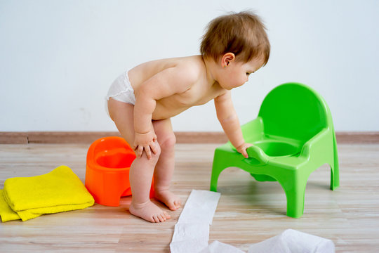 Baby Sitting On A Potty