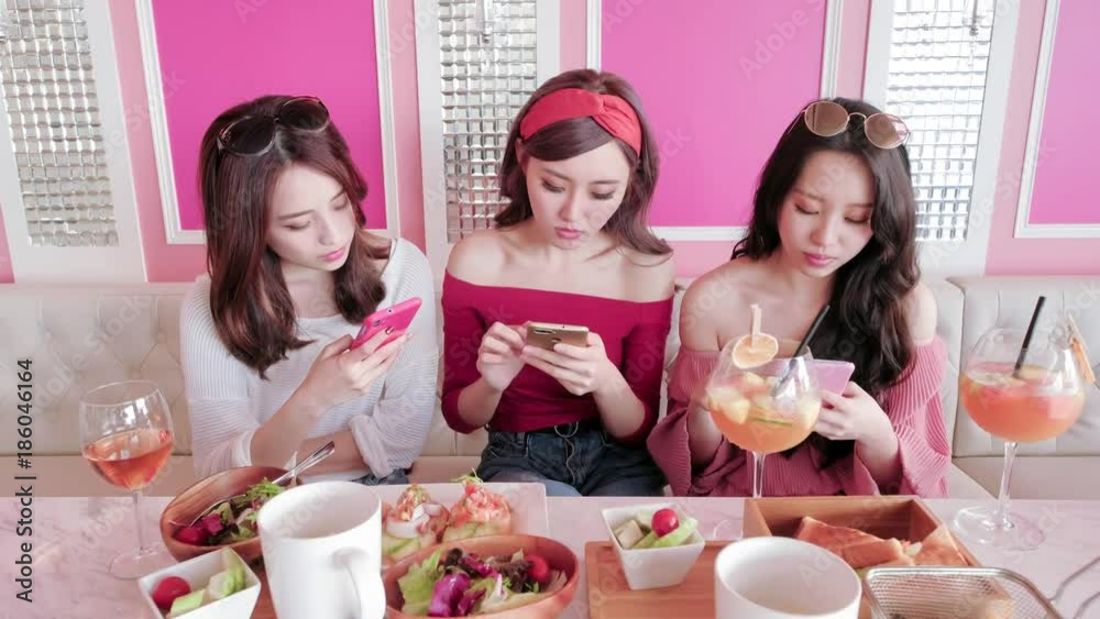 Poster woman use phone in restaurant