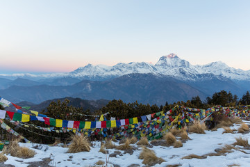 Prayer flags and mountain views on a cold morning