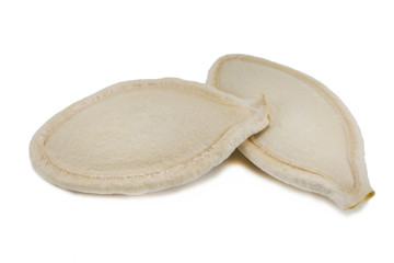 Pumpkin seeds isolated on the white background