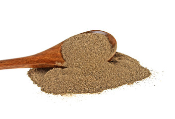 Ground black pepper isolated on white background. Pepper in wooden spoon.