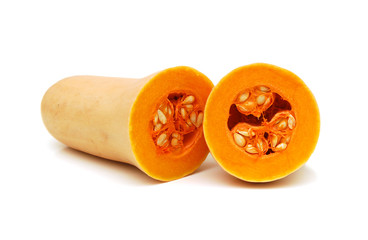 freshly cut butternut pumpkin on a white background