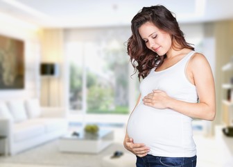 Pregnant woman in room