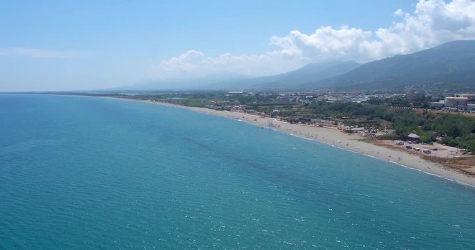 BASTIA, CORSICA, FRANCE &ndash; JULY 2016 : Aerial shot of Bastia cityscape on a sunny day with beach and mountains in view