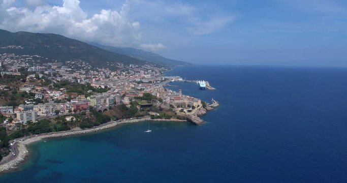 BASTIA, CORSICA, FRANCE &ndash; JULY 2016 : Aerial shot of Bastia cityscape on a sunny day with harbor and sea in view