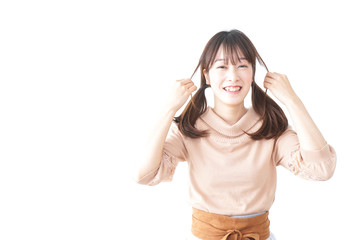 Young woman being relaxed in room