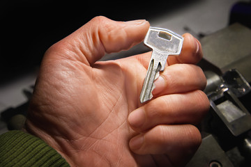 Fototapeta premium Man’s hand with key